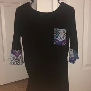 a three-quarter sleeve shirt